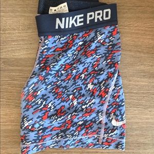 RED WHITE AND BLUE NIKE PROS